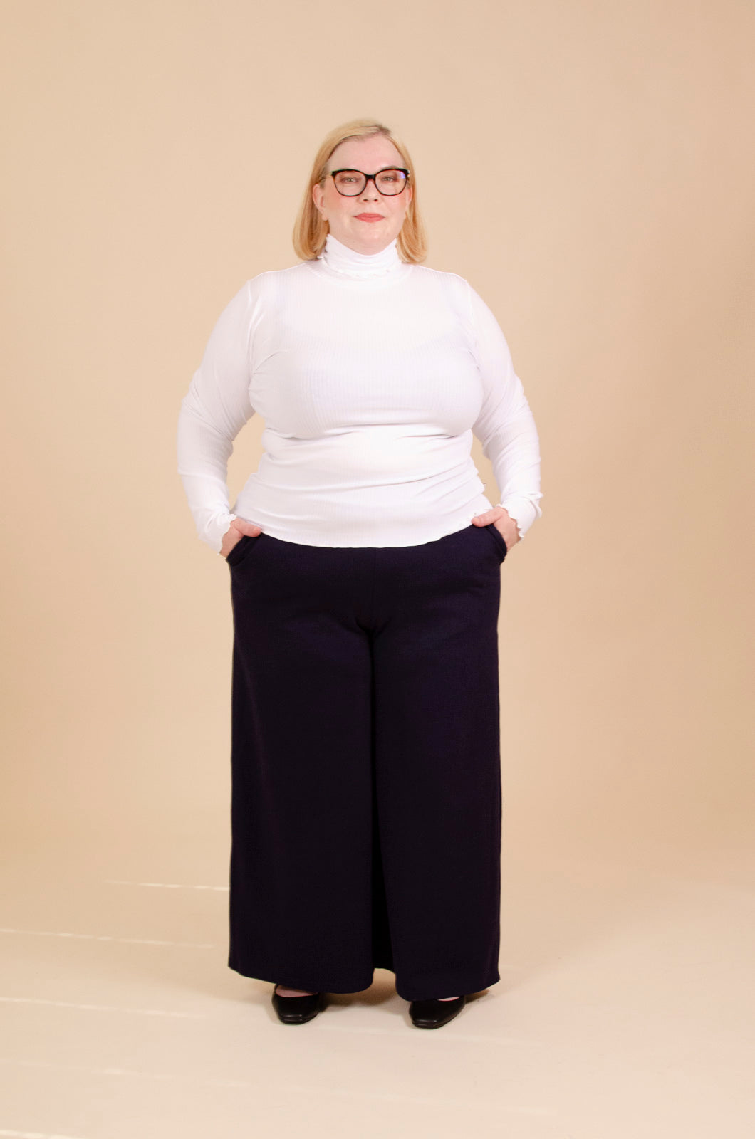 Naisten valkoinen pitkähihainen poolopaita