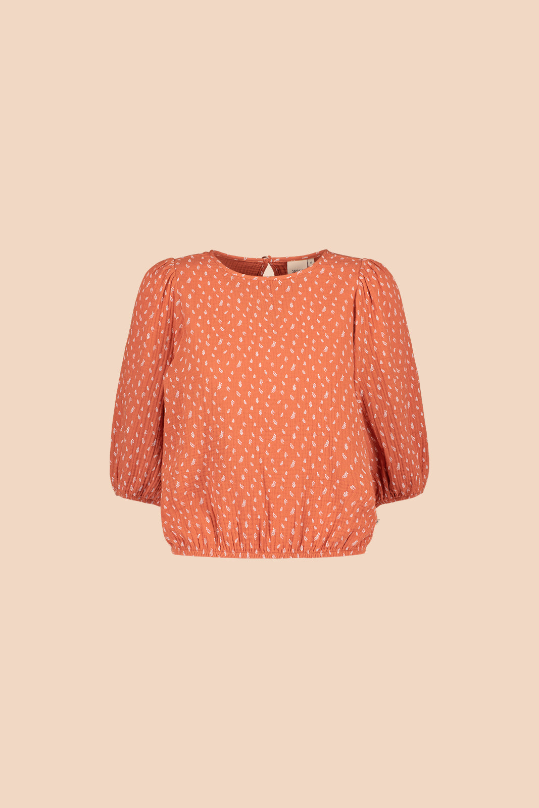 Naisten oranssi puuvillapaita minimalistisella kuosilla