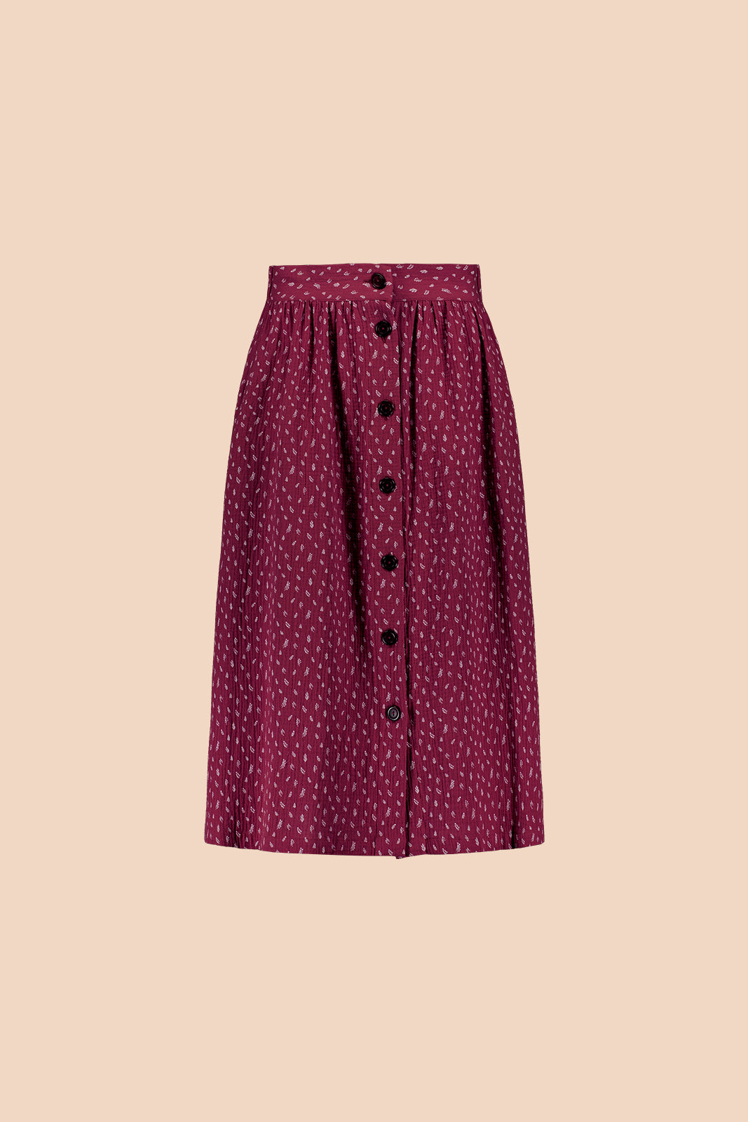 Naisten musliininen nappihame minimalistisella lehtikuosilla