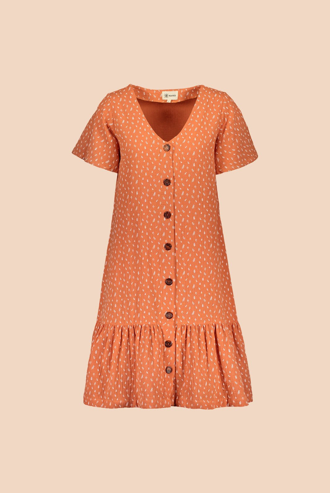Naisten oranssi puuvillamekko minimalistisella kuosilla