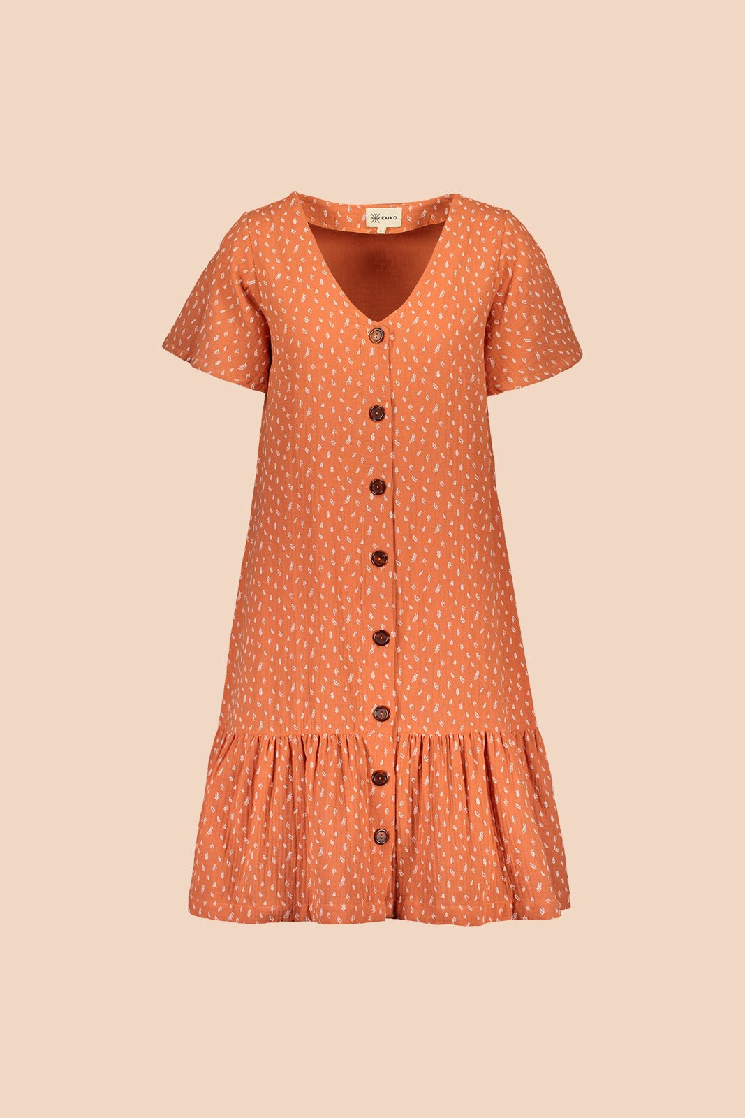 Naisten oranssi puuvillamekko minimalistisella kuosilla