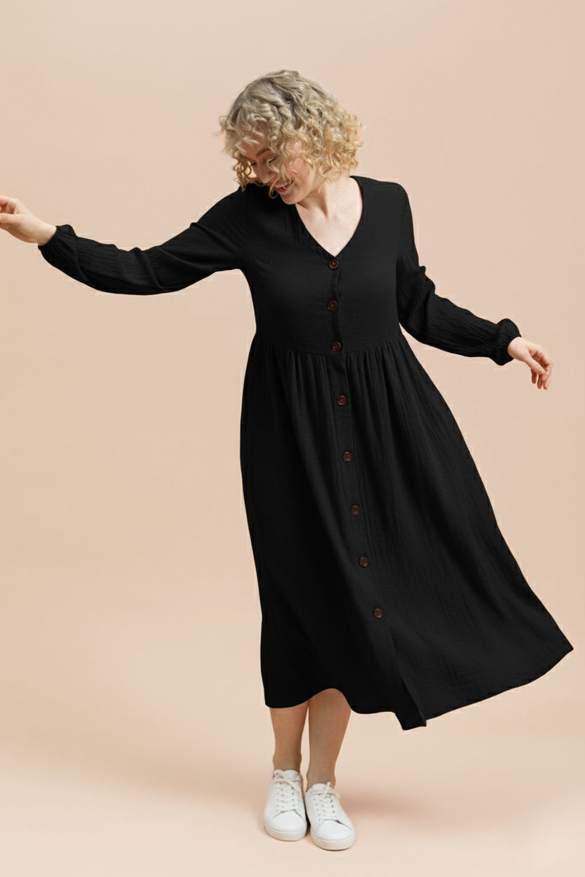 Naisten musta musliininen nappimekko