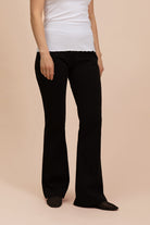 Naisten mustat trumpettihousut