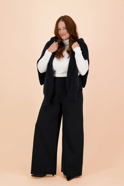 Naisten mustat täyspitkät housut