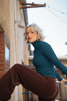 Naisten petroolin värinen poolopaita | modelheight:167, size:XS